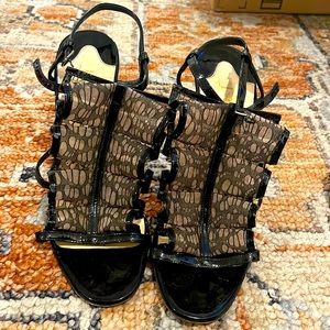 Louboutin heels with lace up mesh detail